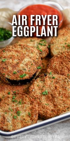 air fryer eggplant cutlets on a plate with ketchup and parsley