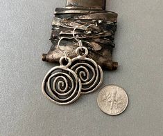 Modern and light weight. Love these awesome spirals! They go with anything...perfect gift for your pal gal Silvertone zinc alloy....lead and nickel free Sterling silver ear wires Gift boxed Thanks for stopping by - please see my shop for more genuine southwest designer jewelry! https://www.etsy.com/shop/ManyBeadsOfSedona Nickel Free Spiral Earrings For Everyday, Nickel-free Spiral Earrings For Everyday, Everyday Spiral Nickel-free Earrings, Everyday Nickel-free Spiral Earrings, Nickel-free Spiral Minimalist Earrings, Minimalist Spiral Nickel-free Earrings, Spiral Metal Jewelry With Oxidized Finish, Minimalist Spiral Nickel-free Jewelry, Nickel-free Black Spiral Jewelry