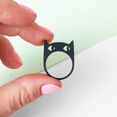 This black cat head ring is made from 3 mm thick matte recycled acrylic.  I can make it in all ring sizes for you, but sizes 17 and 18 are in stock and can be shipped quickly. The processing time for a custom-sized ring is up to one week. Peeking Cat, Head Ring, Cat Ring, Ring Sizes, One Week, Rings Statement, Favorite Jewelry, Statement Rings, Black Cat