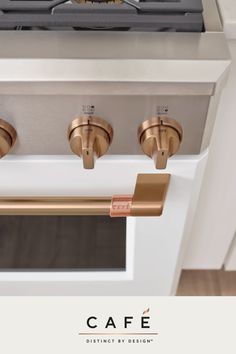 a white stove top oven sitting inside of a kitchen next to a wall mounted oven