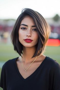 Woman with a bob haircut and red lipstick, wearing a black V-neck shirt and gold necklace, outdoors. Side Braid Hair, Short Hair Side Part, Cute Braids, Side Braid Hairstyles, Side Part Hairstyles