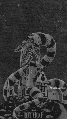 an image of a snake on top of a building with the words beetlejuice written below it