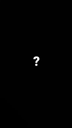 a black background with a white question mark