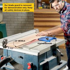 a man working on a table sawing machine