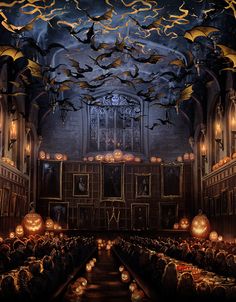 a large room filled with lots of pumpkins and bats flying over the top of it