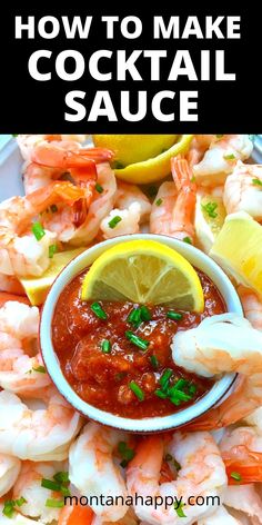 a plate with shrimp, lemon and sauce on it