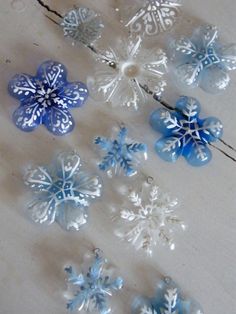 some blue and white snowflakes on a table