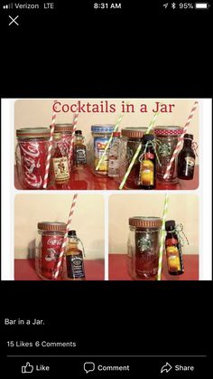 some jars are sitting on a table with straws and drinks in them that say cocktails in a jar