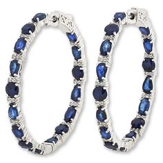 Colleen Lopez Multi-Cut Gemstone Inside/Outside 1.5" Hoop Earrings   Elevate your accessories collection with fine gemstones in a versatile hoop earring design. These bold, sterling silver inside/outside hoops feature your choice of exquisite, colored gemstones paired with sparkling white zircon accents. Choose Emerald, Tanzanite, Multicolor Tourmaline or Blue Sapphire.       Approx. 1-1/2"L x 1/8"W     Stamped .925; rhodium plating     Pierced with hugger backs     Inside/outside hoop earrings     Choice of colored gemstones alternating with trios of round, white zircons   Stone Information       All sizes and weights approximate     Total Carat Weight: 6.68ct (Emerald), 7.67ct (Garnet), 6.5ct (Tanzanite), 6.38ct (Tourmaline), 8.13ct (Sapphire)     White Zircon - Round; 0.45ct     Emerald Fine Jewelry Gemstone Hoop Earrings, Elegant Hoop Jewelry With Gemstone Accents, Gemstone Hoop Earrings Fine Jewelry, Gemstone Hoop Jewelry For Anniversary, Gemstone Hoop Earrings For Anniversary, Gemstone Hoop Anniversary Jewelry, Elegant Round Hoop Earrings With Gemstone Accents, Luxury Hoop Earrings With Gemstone Accents, Luxury Multi-stone Hoop Earrings As Gift