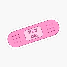 a pink sticker with the words stray kids on it's side and dots