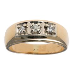 This masculine gentlemen's ring is set with a rectangular top and stepped edges, and contains three prong-set diamonds with a .29 carat total diamond weight (clarity: I-1, SI-1 - SI-2; colour: J-K, I-J). Set in 14kt yellow and white gold.  Measures approx. 9mm from knuckle to knuckle. Gram weight: 9.0 All items in the Estate Jewel Finds are estate pieces created in years gone by. Although this item is in excellent condition, it could have some signs of its age and past enjoyment. The images show Rectangular Three Stone Diamond Ring, Classic Three Stone Rectangular Rings, Classic Rectangular Signet Ring With Diamond Accents, Classic Rectangular Diamond Ring, Rectangular Three Stone Rings For Anniversary, European Cut Diamonds, Round Brilliant Cut Diamond, Rings Statement, Prong Setting