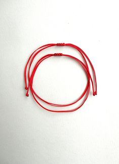 Red string couple bracelet Set of 2 bracelets Anniversary gift Kabbalah bracelet Red string of fate Protection bracelet Waxed cord bracelet This bracelet is made of two red 1mm thick waxed polyester string. It is adjustable to fit all sizes. *Colours may differ slightly from the original due to the configuration of your computer. *There may be light variations on colour and size. *Items appear larger on your monitor than actual size. Affordable Handmade Red Braided Bracelets, Cheap Customized Red Friendship Bracelets, Red Adjustable Friendship Jewelry, Red Adjustable Cord Friendship Jewelry, Red Adjustable Cord Jewelry For Friendship, Red Minimalist Bracelets With Adjustable Cord, Minimalist Red Bracelet With Adjustable Cord, Minimalist Red Bracelets With Adjustable Cord, Red Adjustable Friendship Bracelets