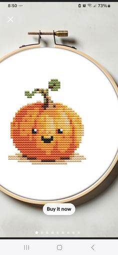 a cross stitch pumpkin with the words buy it now