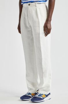 "Find DRAKE'S Games Pleated Linen Pants on Editorialist. Pale, lightweight linen invites easy-wearing comfort in pants styled with a higher waist and crisp reverse pleats emphasizing the roomy, relaxed fit. 31 1/2\" inseam; 17\" leg opening; 12\" front rise; 16\" back rise (size 32) Zip fly with button closure Side-seam pockets; back button-welt and button-flap pockets 100% linen Machine wash, dry flat Made in Italy Designer Clothing" Pleated Linen Pants, Tweed Trousers, Designer Clothing Brands, Linen Suit, Linen Trousers, Pleated Pants, Wool Suit, Trouser Suits, Linen Pants