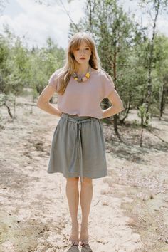 "PRODUCED in 3-5 days FAST & FREE shipping with DHL Express Courier -10% for all items with code \"FAVOURITE\" Feel the spells of nature in this belted mini skirt! Made from breathable linen in a sage green color it is easy to style and comfortable to wear. Details: - 100% Linen - Elastic waistband - Adjustable belt - Two side pockets - Flowy silhouette - Above knee length - Model's height is 172 cm / 5'7'' wears size M - Code: E4002-L532-303 The skirt is available in other colors. You can find them in the gallery. If you want to order the skirt in another color, please specify it in the personalization field. Sizing: This garment is true to size, and we recommend choosing the size you usually wear. If you want the garment to be loose-fitting, choose a larger size than you usually wear. Be Spring Linen Mini Skirt In Relaxed Fit, Relaxed Linen Mini Skirt For Spring, Linen Mini Skirt With Relaxed Fit For Spring, Green Linen Skirt, Linen Mini Skirt, Artistic Ideas, Belted Mini Skirt, Skirt With Belt, Elastic Waist Skirt