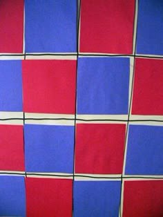 a red, blue and white checkerboard wallpaper