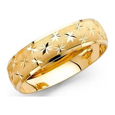 a yellow gold wedding ring with stars on it