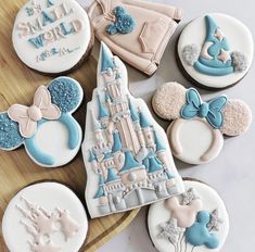 some decorated cookies are sitting on a table