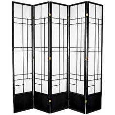 a black and white room divider with four panels