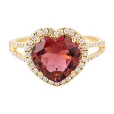 This ring has been meticulously crafted from 18-karat gold. It is hand set in 3.19 carats tourmaline and .37 carats of glittering diamonds. The ring is a size 7 and may be resized to larger or smaller upon request. FOLLOW MEGHNA JEWELS storefront to view the latest collection & exclusive pieces. Meghna Jewels is proudly rated as a Top Seller on 1stDibs with 5 star customer reviews. All items manufactured by us are handmade and can be customized or redesigned. Composition Size-US-7 Total Weight-3.724 Gold Weight(Gms)-3.012 Diamond Wt(Cts)-0.37 Tourmaline Wt(Cts)-3.19 Gold Heart Ring, Head Jewelry, Contemporary Ring, Heart Shaped Rings, Yellow Gold Jewelry, Diamond Glitter, Heart Shaped Diamond, Tourmaline Ring, Valentines Jewelry