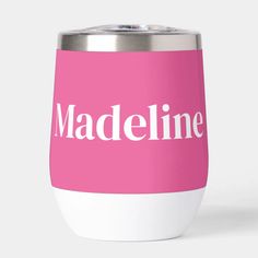 a pink and white tumbler with the word madeline on it's side