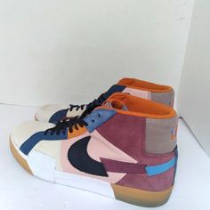 Make A Bold Statement With These Eye-Catching Nike Sb Blazer Mid Premium Sneakers Featuring A Unique Patchwork Design. The Multicolor Panels In Burgundy, Navy, Pink, And Orange Create A Striking Aesthetic That's Perfect For Both Skateboarding And Street Style. The Gum Sole Adds Classic Appeal While Premium Materials Ensure Durability And Comfort. These Sneakers Effortlessly Elevate Casual Outfits And Are Ideal For Urban Adventures Or Skate Sessions. Keywords: Nike Sb, Blazer Mid, Skateboarding S Brown High-top Custom Sneakers For Skateboarding, Urban Multicolor Leather Sneakers, Nike Multicolor Leather Sneakers, Nike Multicolor Skate Shoes With Rubber Sole, Multicolor Nike Leather Sneakers, High-top Multicolor Skate Shoes With Contrast Sole, Multicolor High-top Skate Shoes With Contrast Sole, Nike Multicolor High-top Sneakers With Rubber Sole, Multicolor Nike Skate Shoes