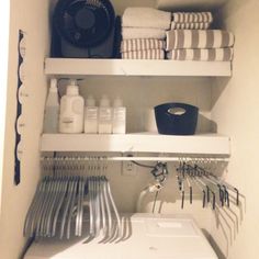 a white washer and dryer sitting inside of a closet