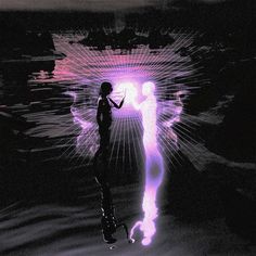 a woman standing in front of a purple light