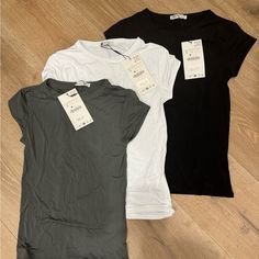 Brand New, Never Been Worn. Three Super Comfortable Zara Tees. The Material Is Very Stretchy And Breathable, And Could Even Be Worn For Working Out. Zara Basic Stretch T-shirt, Zara Stretch Crew Neck T-shirt, Trendy Stretch Tops From Zara, Zara Black Basic Tops, Zara Basic Black Tops, Zara Tshirts, Long T Shirts, Tshirts Women, T Shirts Women