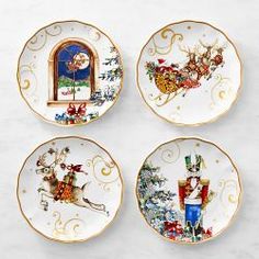 four plates decorated with christmas scenes on them