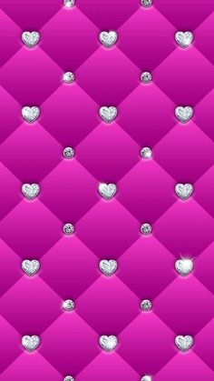 a pink background with hearts and diamonds on it