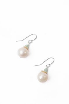 The Serenity Collection is beloved classic line from Anne Vaughan Designs. These mindfully crafted earrings are ideal for pairing with other items from the collection. Sterling Silver (nickel and lead-safe) Freshwater Pearl, Chalcedony 1", with sterling silver ear wires We hand select our natural materials, thus there may be slight variations in color and/or size that will not detract from the overall aesthetic Our unique handcrafted designer jewelry for women is made in America, each design cre Gift Pearl Earrings With French Hook, Classic Silver Jewelry With French Hook, Sterling Silver Drop Earrings For May Birthstone, Pear-shaped Jewelry Gift, Sterling Silver Pearl Earrings With French Hook, Elegant Sterling Silver Earrings For May Birthstone, Silver Pearl Earrings With French Hook As Gift, Elegant Sterling Silver Earrings With May Birthstone, White Sterling Silver Jewelry With French Hook