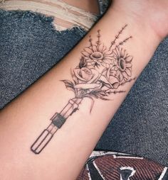 Star Wars Theme Tattoo, Star Wars Female Tattoo, Wand And Lightsaber Tattoo, Sunflower And Rose Bouquet Tattoo, Star Wars Tattoo Flowers, Flower Lightsaber Tattoo, Pretty Star Wars Tattoo, Matching Star Wars Tattoo Couples