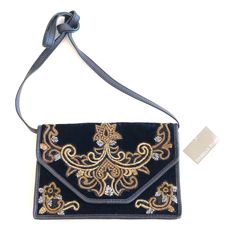 Personally Purchased But Never Used Isabella Fiore Embellished Very Dark Blue/Black Velvet Shoulder And/Or Clutch With Leather Trim Has Tag And Dust Bag Never Used But Stored, Minor Rubbing Of Leather From Storage See Pictures Removable Adjustable Strap Inner Zipper And Pockets Gold Appliqu And Just The Right Amount Of Sequins. Elegant Black Embroidered Shoulder Bag, Luxury Embroidered Evening Shoulder Bag, Luxury Embroidered Shoulder Bag For Evening, Elegant Embroidered Blue Shoulder Bag, Elegant Blue Embroidered Shoulder Bag, Formal Embroidered Shoulder Bag, Elegant Embroidered Crossbody Bag, Elegant Embroidered Formal Shoulder Bag, Elegant Formal Embroidered Shoulder Bag