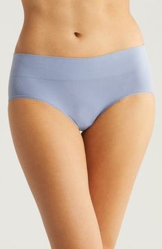 Smooth, stretchy and invisible under outfits, these everyday hipster briefs feature a no-pinch wide waistband and sweet picot trim around the leg openings. Lined waistband Four-way-stretch fabric 91% nylon; 9% spandex Hand wash, line dry Imported Supportive Seamless Bottoms For Daywear, Elastic Seamless Shapewear Bottoms, Elastic High-cut Leg Seamless Bottoms, Elastic Seamless High-cut Leg Bottoms, Seamless Elastic High-cut Leg Bottoms, Daywear Bottoms With Contoured Stretch Waistband, Stretch Bottoms With Contoured Waistband For Daywear, Micro-elastic Briefs With Contoured Waistband, Blue Stretch Smoothing Bottoms