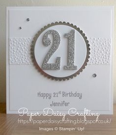 a 21st birthday card with the number twenty one in silver glitter on it's front