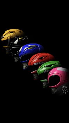 five different colored helmets on a black background