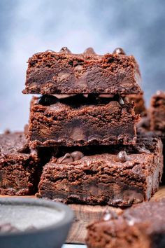 chocolate brownies stacked on top of each other