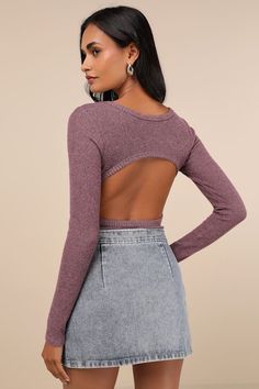 Getting ready for the week just got so much easier (and cuter) thanks to the Lulus Everyday Babe Heather Purple Ribbed Long Sleeve Cutout Bodysuit! Stretchy, ultra-soft ribbed knit fabric (with a heathered effect) shapes a crew neckline framed by long fitted sleeves, atop a figure-hugging bodice with an flirty back cutout. Attached thong bottoms secure with snap closures. Pairs perfectly with your fave denim bottoms! Fit: This garment fits true to size. Length: Size medium measures 30" from shoulder to hem. Bust: Great for any cup size. Waist: Fitted - stretchy fabric allows custom fit. Hip: Fitted - stretchy fabric allows room for hips. Undergarments: May be worn with an adhesive bra, petals, or no bra. Fabric: Fabric is very stretchy. Unlined. 77% Rayon, 19% Polyester, 4% Spandex. Hand W Ribbed Bodysuit For Night Out In Spring, Denim Bottoms, Heather Purple, Fitted Sleeves, Cutout Bodysuit, Adhesive Bra, Long Sleeve Bodysuit, School Outfits, Stretchy Fabric