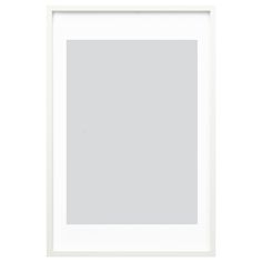 an empty white frame on a white wall