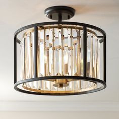 a light fixture hanging from the ceiling in a room