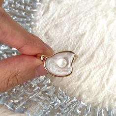 Stunning real natural freshwater pearl and shell statement cocktail chunky ring, open adjustable ring. White shell signet with natural pearl paved in the center, 14k rose gold plated finish. Super unique and creative, elevate your dainty vibes, easy to stacking. Perfect gift to treat yourself and your friends/family, you will get lots of compliments for sure! ♥ All of our jewelry are carefully handmade with delicate and exquisite details, all designed and made in Manhattan, New York. 💎 Features Mother Of Pearl Ring, Chunky Ring, Shell Ring, Beautiful Gift Wrapping, Chunky Rings, Natural Pearl, Tahitian Pearls, Jewelry Inspo, Cuff Earrings