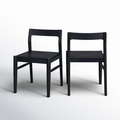 two black chairs side by side on a white background