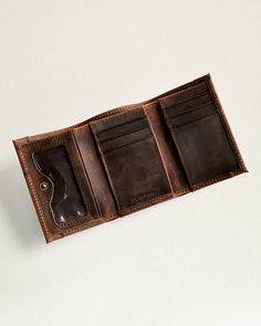 This trifold wallet features a snap closure, ID window, coin pocket, and multiple card slots, providing ample space for all your essentials. With the added protection of RFID technology, your personal information stays safe and secure. Made with Pendleton USA wool in a unique pattern and finished with leather trim, each wallet is one-of-a-kind. Please note that pattern placement may vary. Loving the Pasco Design? Check out the additional matching bags. Pasco Trifold Wallet: Size Closed: 3"W x 4 1/2;"H x 1/2" 100% pure virgin wool; cotton trim Wool fabric woven in Pendletons American mills. Care: Spot clean. No sales tax. Check out our Facebook Photos and Instagram to find fun and inspirational ideas for decorating any space. Trifold Wallet With Card Slots For Everyday Use, Everyday Trifold Wallet With Card Slots, Vintage Trifold Wallet With Coin Pocket For Travel, Vintage Trifold Wallet With Interior Card Slots, Trifold Wallet With Interior Card Slots For Travel, Vintage Leather Trifold Wallet For Travel, Rfid Blocking Trifold Wallet For Everyday Use, Vintage Trifold Wallet With Coin Pocket, Vintage Trifold Wallet With Card Slots