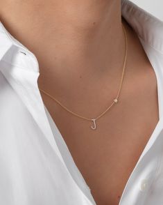 Beautifully handcrafted 14k gold pave diamond initial and a small bezel diamond on a dainty cable link chain necklace. Available in white, yellow and rose gold. This stunning piece will be you new favorite necklace! Wear it with your initial, or your loved one's. Made in L.A. Size of Initial: Approx. 8mm Diamond Bezel Carat Weight: Approx. 0.03 (ct. tw) Diamond Clarity: VS Diamond Initial Carat Weight: Approx. 0.11 (ct. tw) Ships in 4-9 business days Rush orders ship in 2-5 business days All per Bezel Necklace Diamond, Diamond Initial Necklace, Pretty Jewelry Necklaces, Evil Eye Necklace Gold, Double Chain Necklace, Gold Letter Necklace, Bezel Necklace, Initial Necklace Gold, Vs Diamond