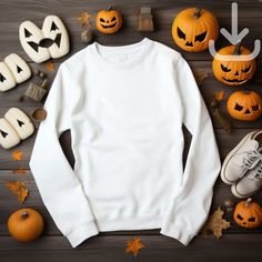 Featuring a flat lay white Gildan 18000 sweatshirt looking all ready for your Halloween store !  This mockup template is perfect for anyone in the Print On Demand industry or looking for a simple and stylish lifestyle mockup. With this digital download, you'll have access to a high-quality image that'll be sure to make your shop stand out and sell those shirts! Don't wait, add this beautiful mockup to your collection today!  Available colors: White  Mockup Details:  Brand:  Gildan 18000 ATTN: Although most colors should match the mockups on Printify and Printful, there may be a few that are slightly off. If you encounter any issues with the color you want to use, please send me a message and I will work with you to find a solution.  This is an instant download with no physical item to be s White Halloween Sweatshirt For Streetwear, Casual White Sweatshirt For Halloween, White Halloween Hoodie Long Sleeve, White Halloween Hoodie, White Long Sleeve Hoodie For Halloween, White Long Sleeve Halloween Hoodie, White Long Sleeve Halloween T-shirt, White Long Sleeve T-shirt For Halloween, Fall White Printed Sweatshirt