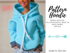 the doll is wearing a blue hoodie and has her hands in her pockets,