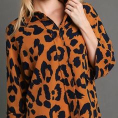 Liza's Umgee Blouse Top w/ Navy Animal Print  Ochre Background  You will love this classy Animal Print Button up blouse! Dark Navy Blue with Ochre Background  Pair it with our Navy Layering Dress HERE  Bust Sizes: Small: 36" Medium: 38"-40" Large: 40"-42" Extra Large: 42"-44" 1X: 44"-46" 2X: 46"-48" Actual colors may vary slightly due to differences in lighting and monitors. Leopard Print Button-up Top, Leopard Print Button-up Top With Buttons, Leopard Print Long Sleeve Top With Buttons, Long Sleeve Leopard Print Top With Buttons, Leopard Print Button-up Top For Work, Fall Leopard Print Tops With Buttons, Fall Leopard Print Button-up Blouse, Blouse Price, Layer Dress