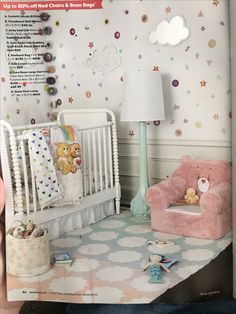 a baby's room with a crib, teddy bear and other items on the floor