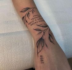 a person with a tattoo on their arm